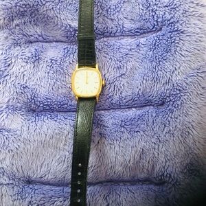 Gold and Black Leather Strap Watch
